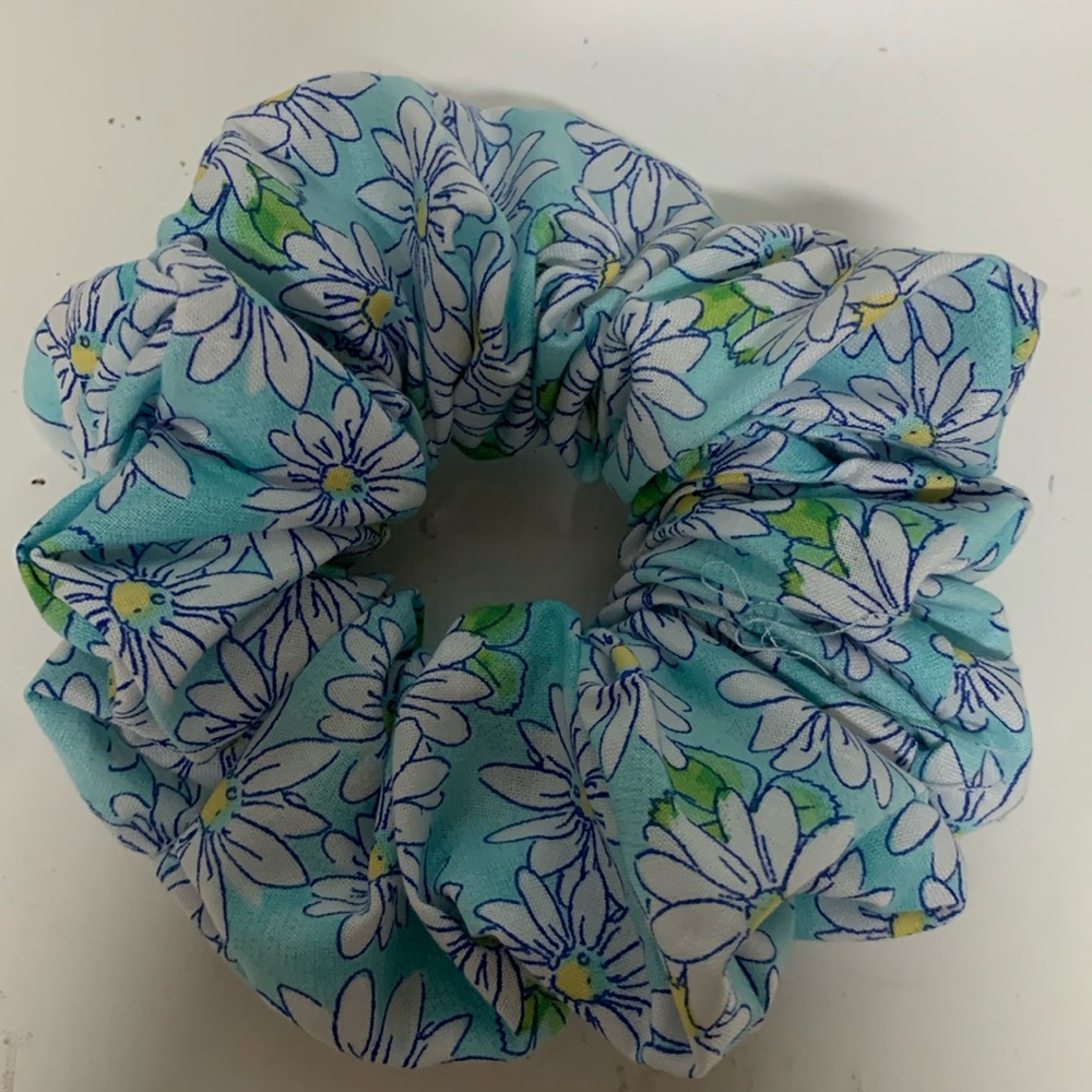 Greenish blue Scrunchie with with and yellow daisies